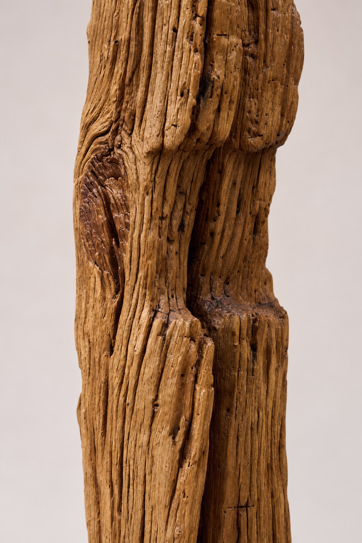 Handcrafted sculptural luminary with warm light texture